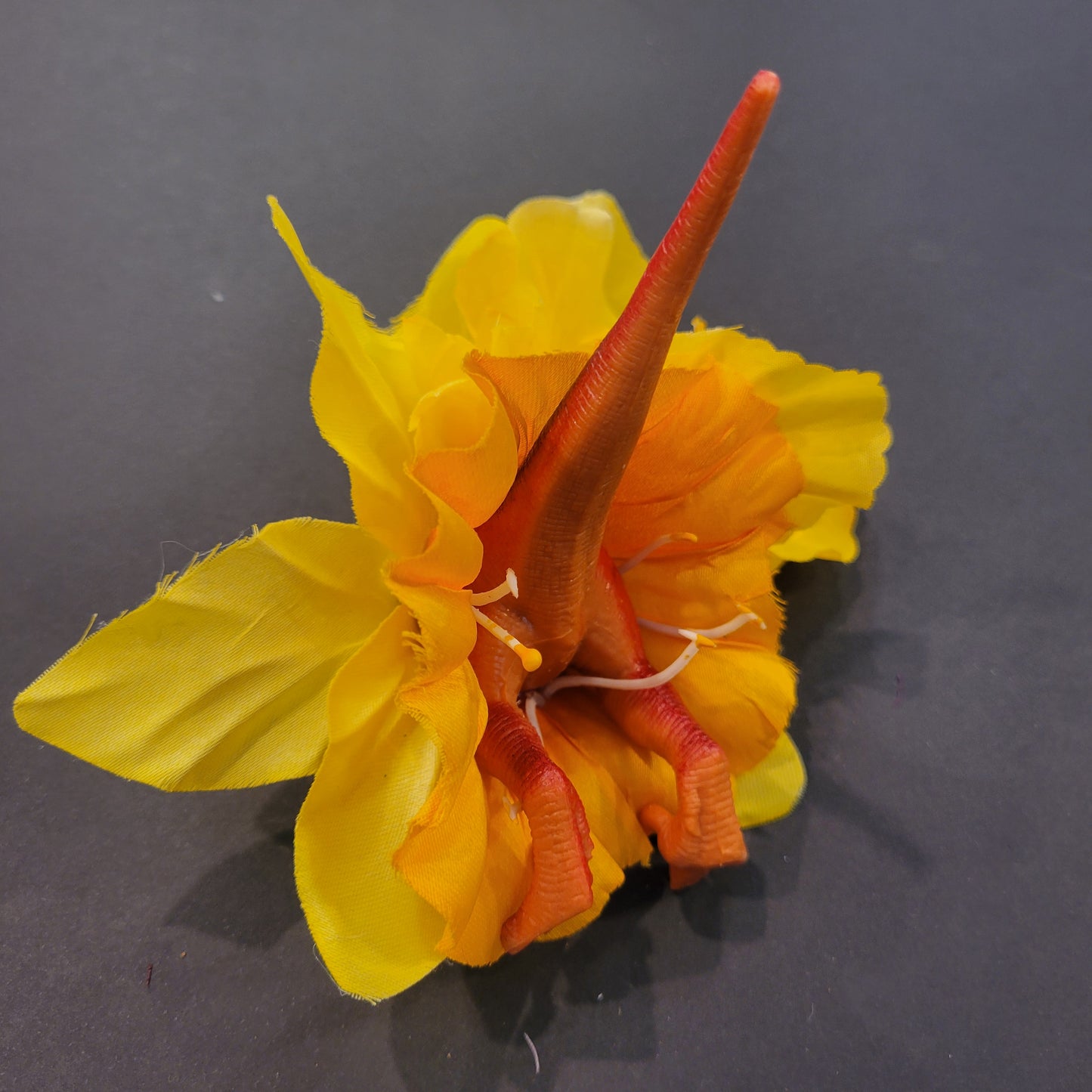 Fleur à cheveux Dinosaure