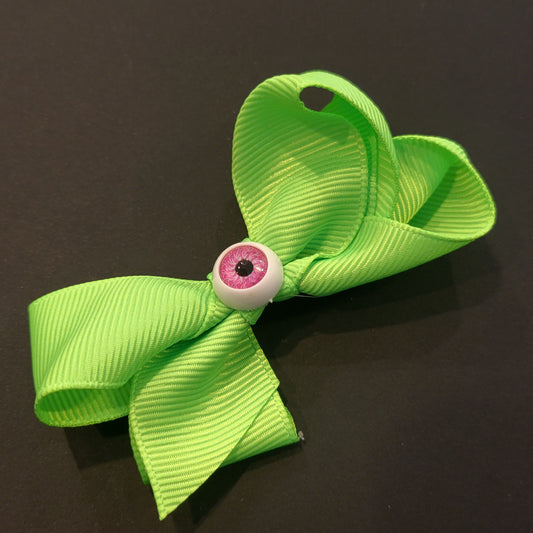 Boucle à cheveux vert oeil rose
