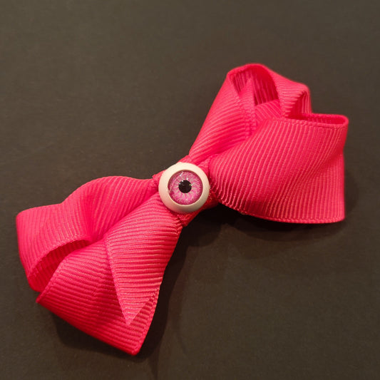 Boucle à cheveux rose oeil rose